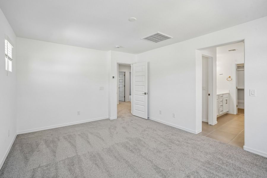 Spacious, unfurnished interior of a new home in Rancho Mercado, Surprise (Image 28).