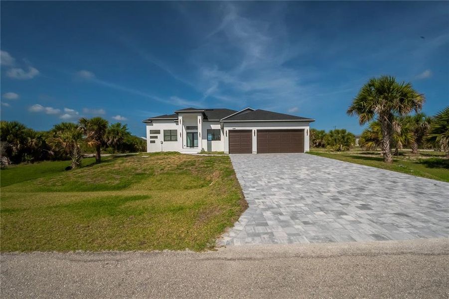Front exterior of a new home in , Port Charlotte, FL, highlighting curb appeal (Image 27).