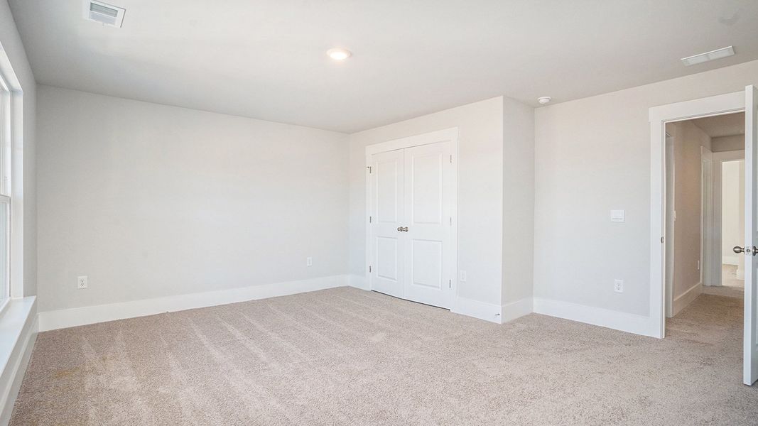 Spacious, unfurnished interior of a new home in Coastal Farms, Conway (Image 26).