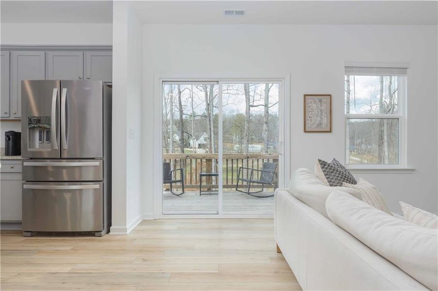 Furnished interior view inside a new home in Creekside at Farmers Crossing, Ball Ground (Image 13).