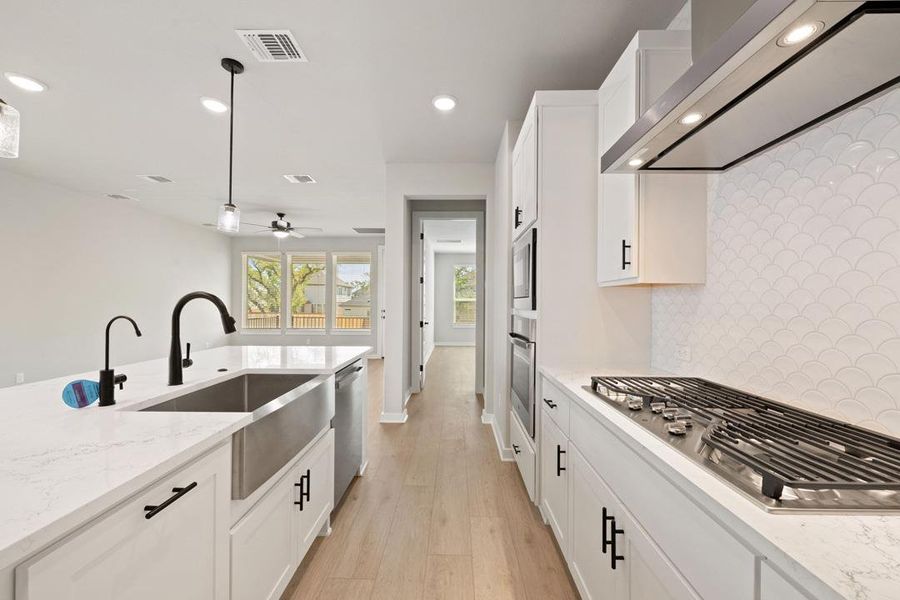 Furnished interior view inside a new home in Heritage, Dripping Springs (Image 14).