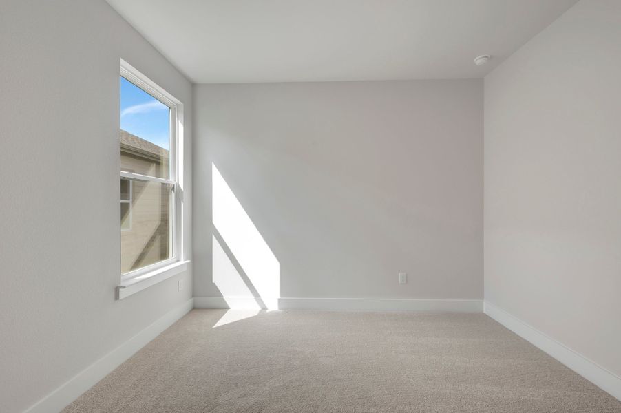 Spacious, unfurnished interior of a new home in The Meadows, Denton (Image 26).