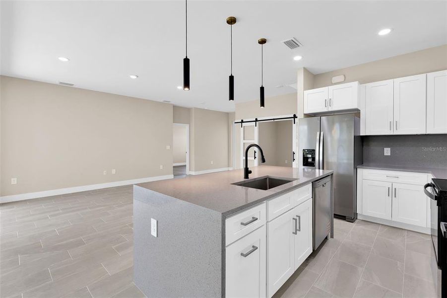 Furnished interior view inside a new home in , Port Charlotte (Image 13). Furnished interior view inside a new home in , Port Charlotte (Image 13).