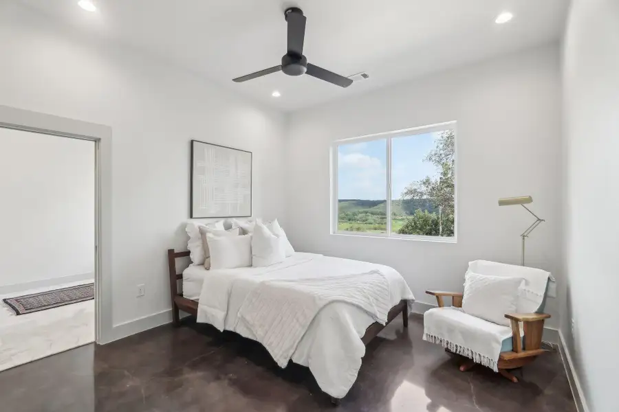 Bedroom with recessed lighting, baseboards, and ceiling fan Bedroom with recessed lighting, baseboards, and ceiling fan