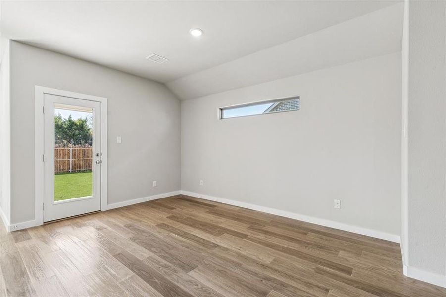 Dining Room in the Heisman home plan by Trophy Signature Homes – REPRESENTATIVE PHOTO Dining Room in the Heisman home plan by Trophy Signature Homes – REPRESENTATIVE PHOTO