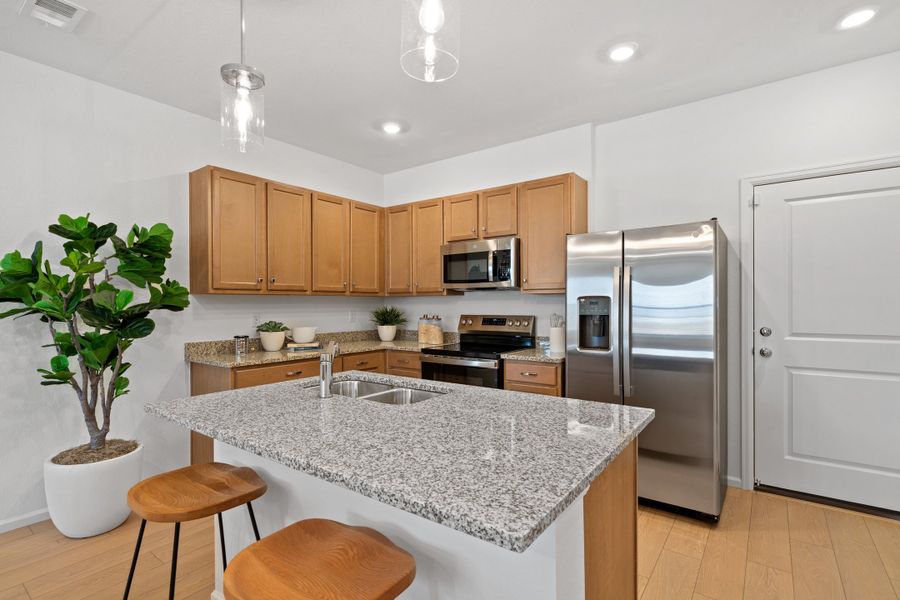 Representative furnished interior of a home built from the 2002 by Risewell Homes in Harvest Crossing, Aurora (Image 5).