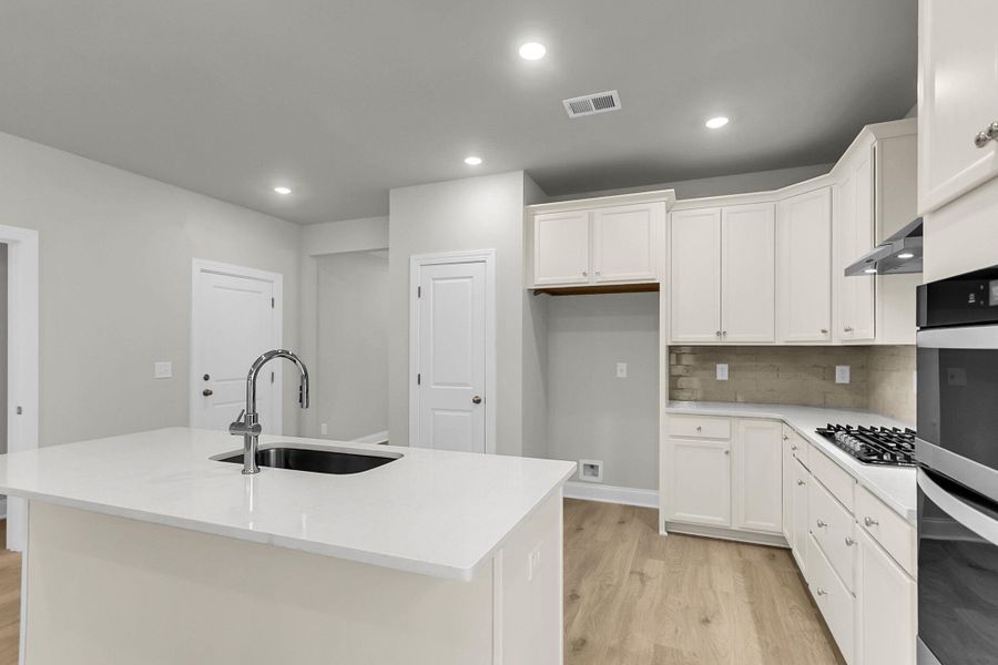 Furnished interior view inside a new home in Tidewater at Lakes of Cane Bay, Summerville (Image 10).