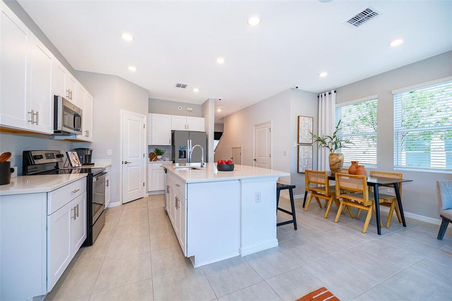Furnished interior view inside a new home in Horse Creek at Crosswinds, Davenport (Image 10).