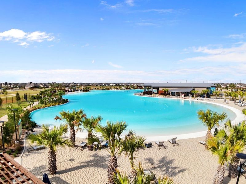 The star feature of The Sol Club is a Crystal Lagoons® amenity where people can walk along white-sand beaches, swim, kayak and paddleboard on turquoise blue waters — it’s a tropical vacation that can be yours when you live in Sunterra! Surrounding the lagoon is The Sol Club amenity village and more just a bike away! The star feature of The Sol Club is a Crystal Lagoons® amenity where people can walk along white-sand beaches, swim, kayak and paddleboard on turquoise blue waters — it’s a tropical vacation that can be yours when you live in Sunterra! Surrounding the lagoon is The Sol Club amenity village and more just a bike away!