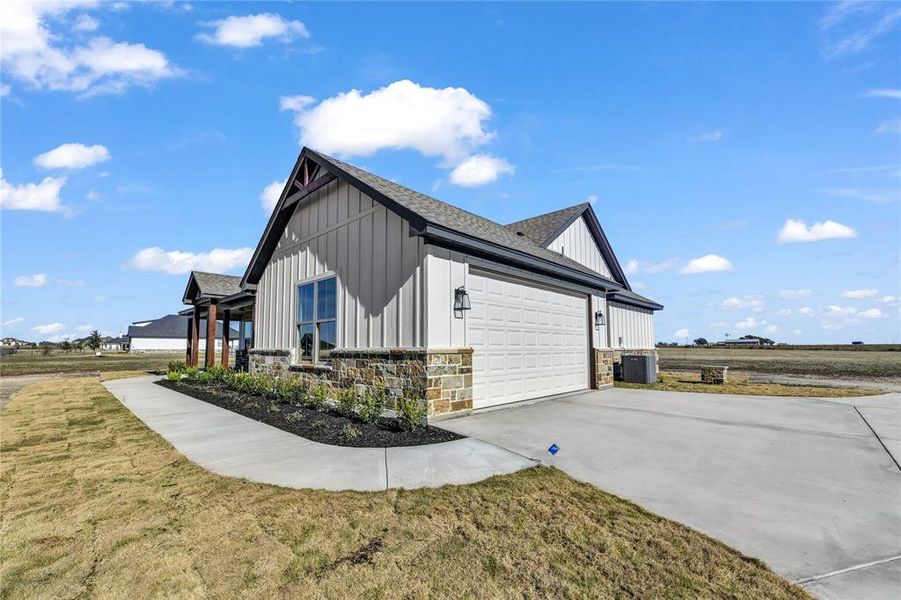 Front exterior of a new home in , Cresson, TX, highlighting curb appeal (Image 25).