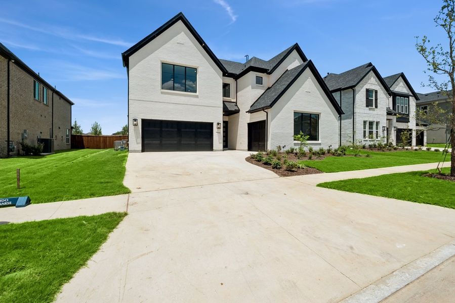 Representative exterior photo of a completed home built from the Langford by Landon Homes in Lexington Frisco, Frisco, TX (Image 1). Representative exterior photo of a completed home built from the Langford by Landon Homes in Lexington Frisco, Frisco, TX (Image 1).