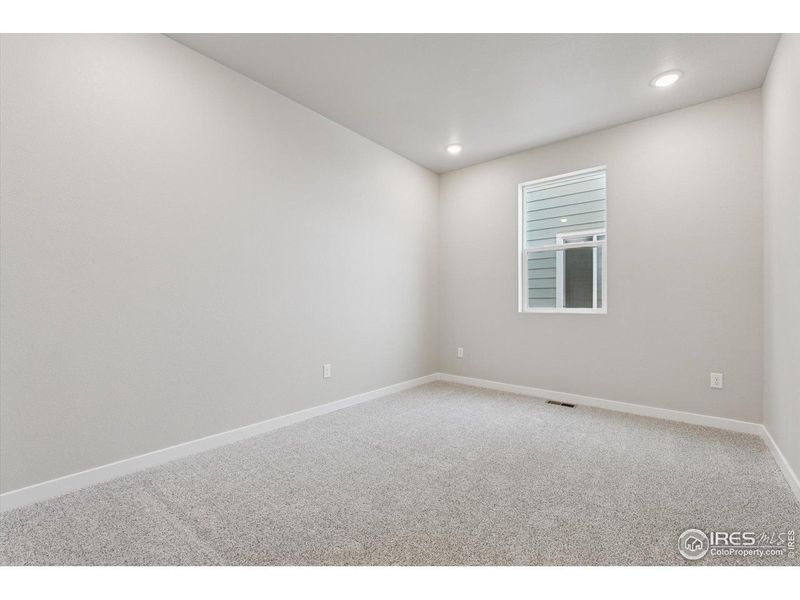 Spacious, unfurnished interior of a new home in The Overlook at Johnstown Farms, Johnstown (Image 19).