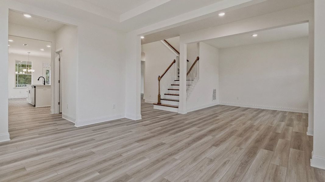 Stonehaven home plan front entry with adjacent formal dining room and flex space