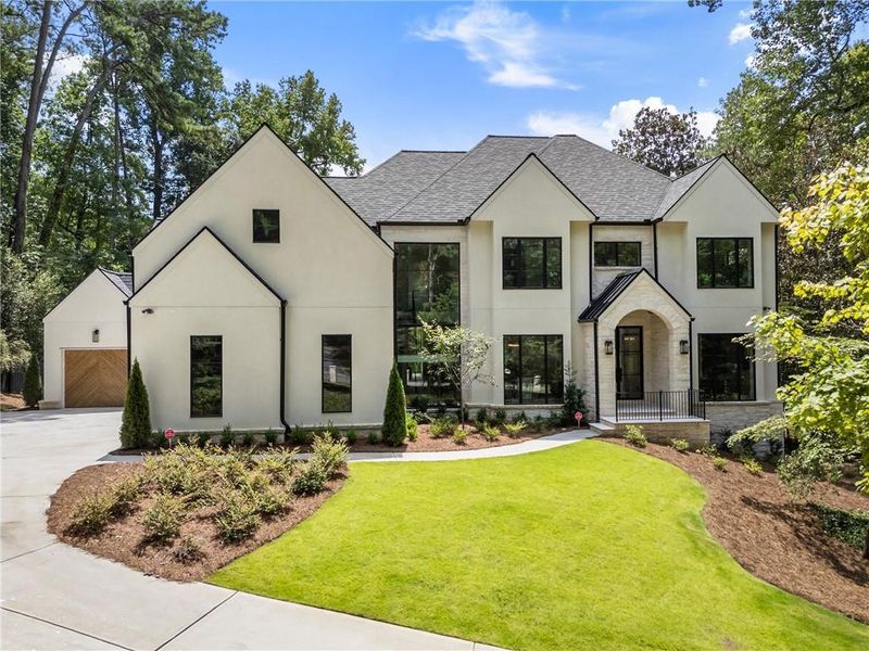Front exterior of a new home in , Sandy Springs, GA, highlighting curb appeal (Image 28). Front exterior of a new home in , Sandy Springs, GA, highlighting curb appeal (Image 28).