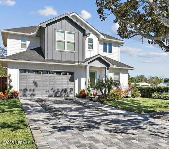 Front exterior of a new home in , Jacksonville Beach, FL, highlighting curb appeal (Image 1).