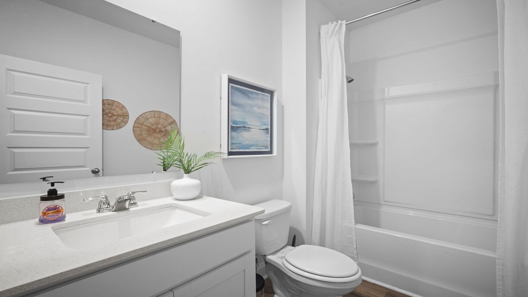 Representative furnished interior of a home built from the Cantey-exp by D.R. Horton in The Lakes at North Glynn, Brunswick (Image 23).