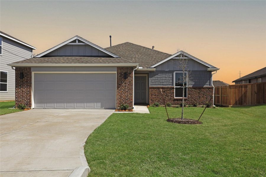 Front exterior of a new home in Santa Fe, Cleveland, TX, highlighting curb appeal (Image 2). Front exterior of a new home in Santa Fe, Cleveland, TX, highlighting curb appeal (Image 2).