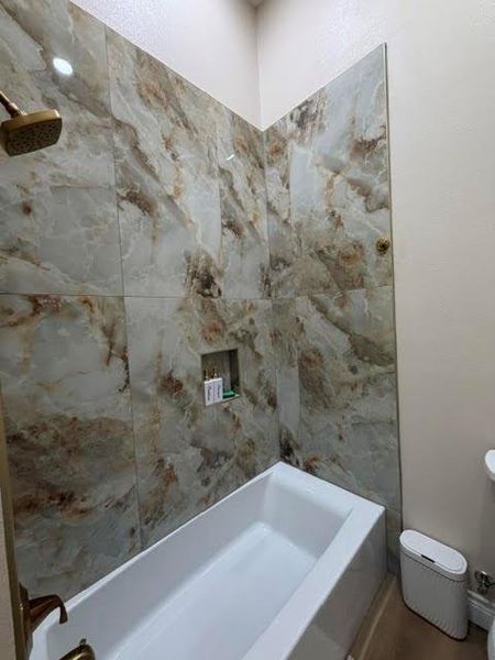 Furnished interior view inside a new home in , El Campo (Image 6).