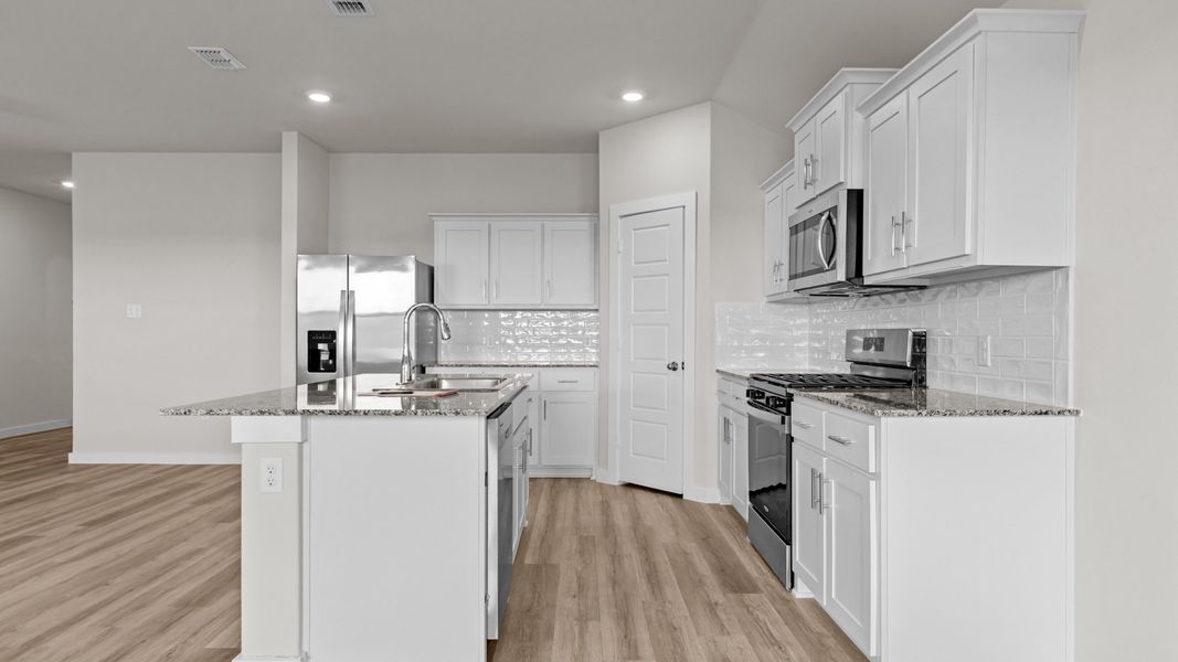 Representative furnished interior of a home built from the DEAN by D.R. Horton in Heritage Parks, Abilene (Image 7).