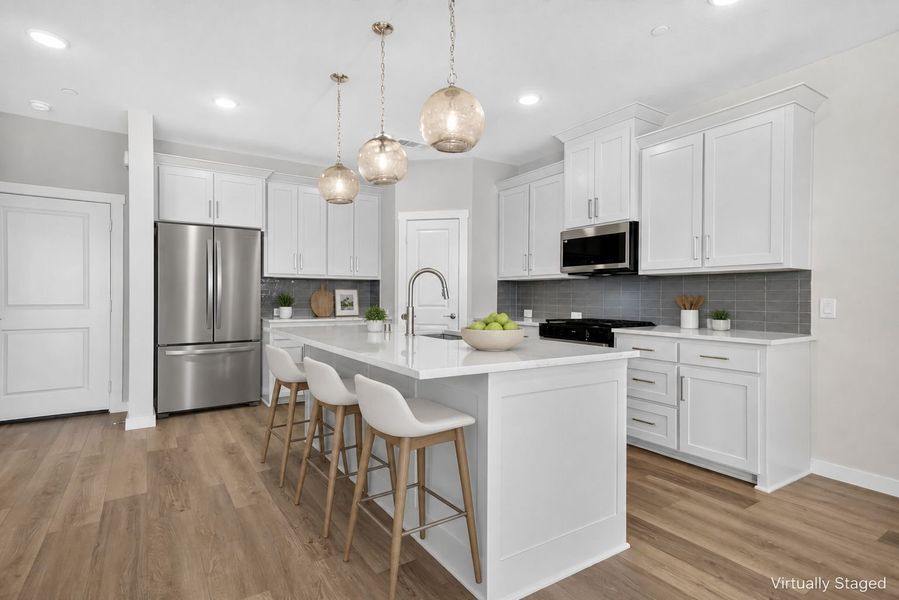 Furnished interior view inside a new home in The Tribute, The Colony (Image 12).