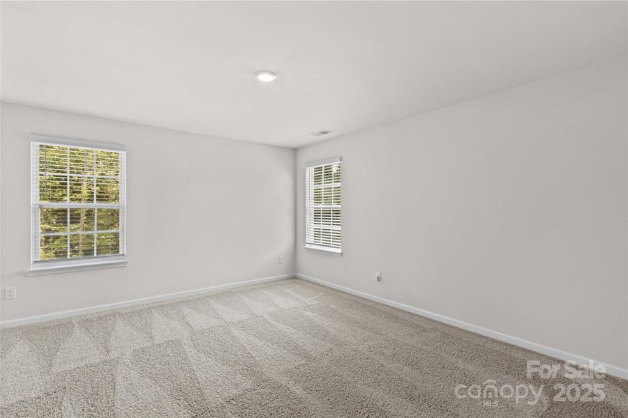 Spacious, unfurnished interior of a new home in Calvin Creek, Troutman (Image 22).