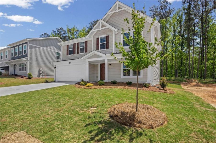 Front exterior of a new home in Sage Woods, Dallas, GA, highlighting curb appeal (Image 19).