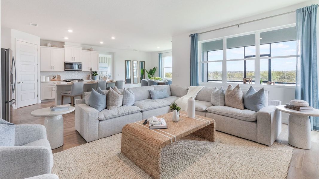 Representative furnished interior of a home built from the DENHAM by D.R. Horton in Lakes of Mount Dora, Mount Dora (Image 7).