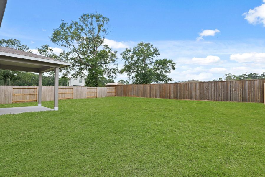 Exterior details and patio area of a home in Lakes at Crockett Martin, Conroe (Image 4). Exterior details and patio area of a home in Lakes at Crockett Martin, Conroe (Image 4).