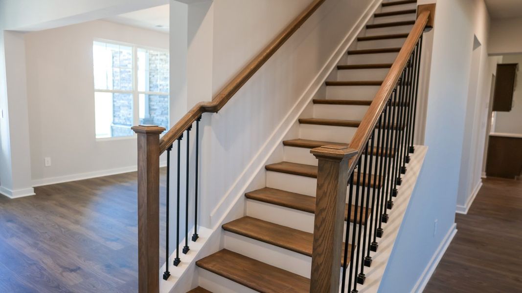 Representative unfurnished interior of a home built from the TISDALE by D.R. Horton in Harvest Point, Spring Hill (Image 33).