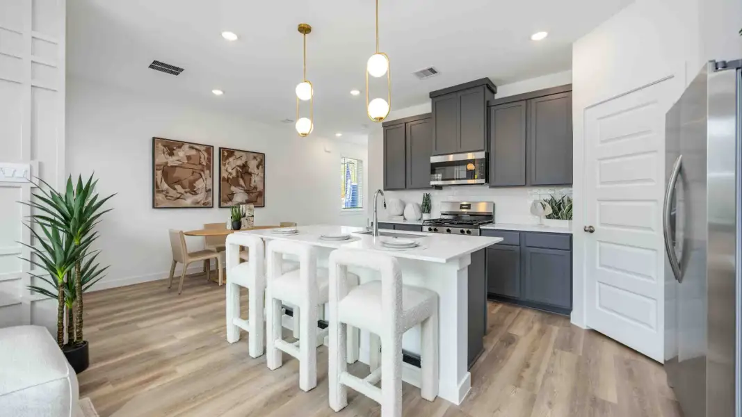Representative furnished interior of a home built from the Iris by D.R. Horton in Palmi, Houston (Image 8).