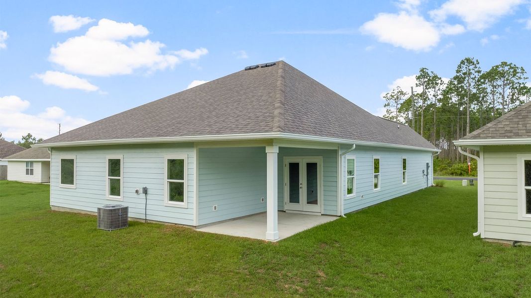 Exterior details and patio area of a home in Buffer Farms, Port Saint Joe (Image 3). Exterior details and patio area of a home in Buffer Farms, Port Saint Joe (Image 3).