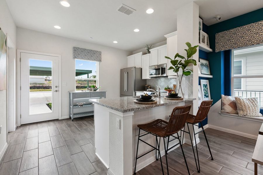 Furnished interior view inside a new home in Whisper Valley, Manor (Image 12).