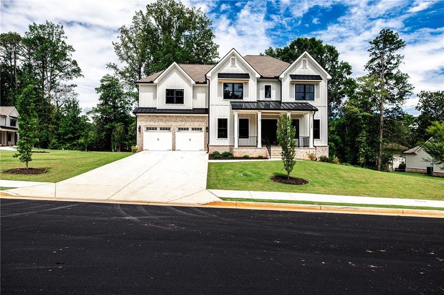 Front exterior of a new home in , Atlanta, GA, highlighting curb appeal (Image 1). Front exterior of a new home in , Atlanta, GA, highlighting curb appeal (Image 1).