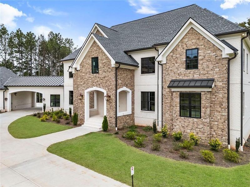 Front exterior of a new home in , Milton, GA, highlighting curb appeal (Image 25). Front exterior of a new home in , Milton, GA, highlighting curb appeal (Image 25).