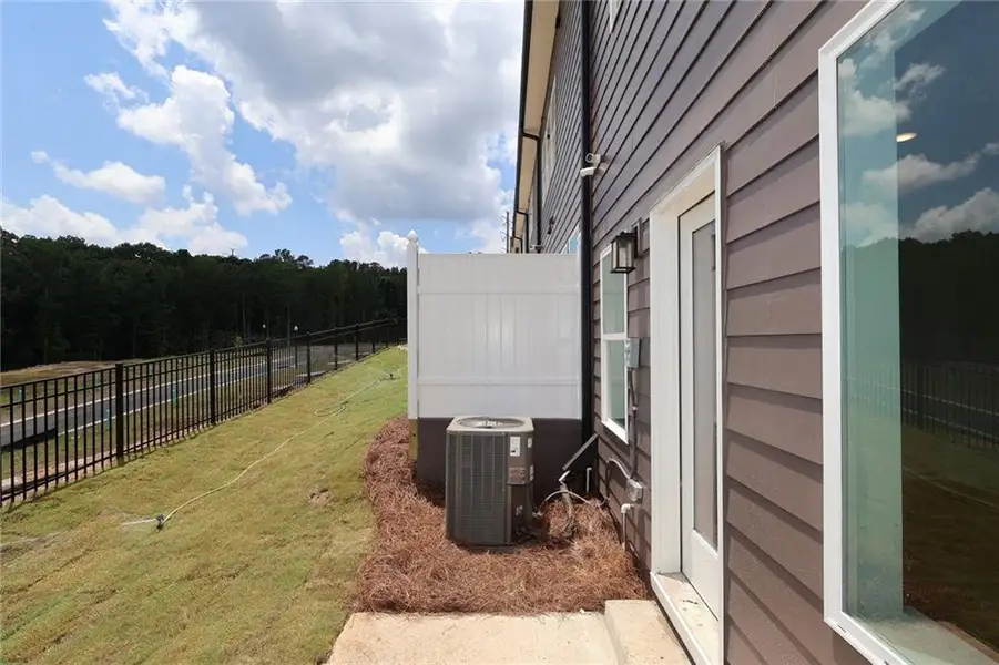 Exterior details and patio area of a home in Grandview Terrace, Canton (Image 2). Exterior details and patio area of a home in Grandview Terrace, Canton (Image 2).