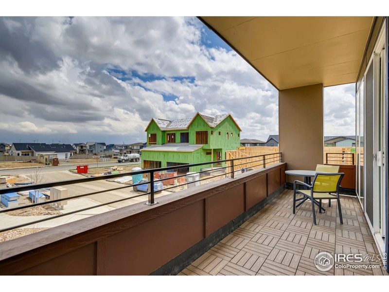 Covered outdoor deck. Photos are of the model home.