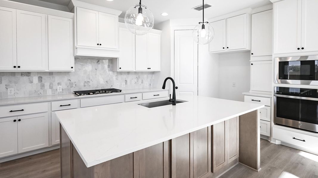 Furnished interior view inside a new home in Crosswinds 50', Kyle (Image 4).