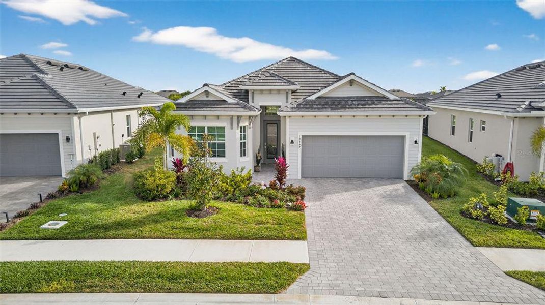 Front exterior of a new home in , Venice, FL, highlighting curb appeal (Image 24).