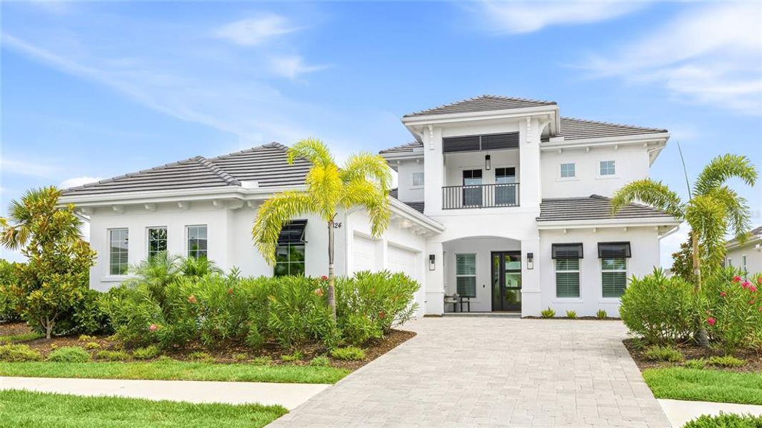 Front exterior of a new home in , Sarasota, FL, highlighting curb appeal (Image 28).