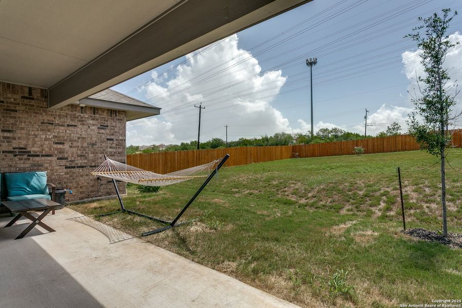 Exterior details and patio area of a home in West Pointe Gardens, San Antonio (Image 3).