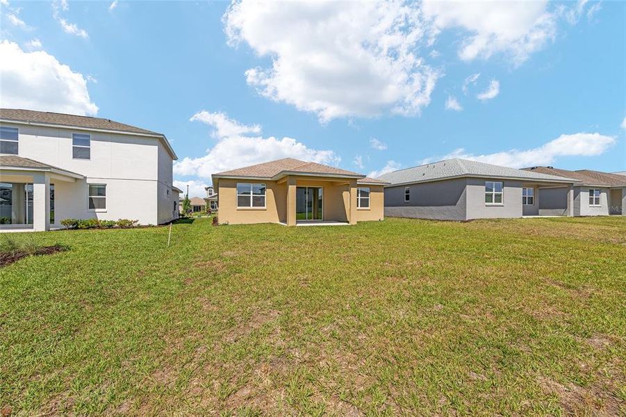Exterior details and patio area of a home in Calesa Township, Ocala (Image 25).