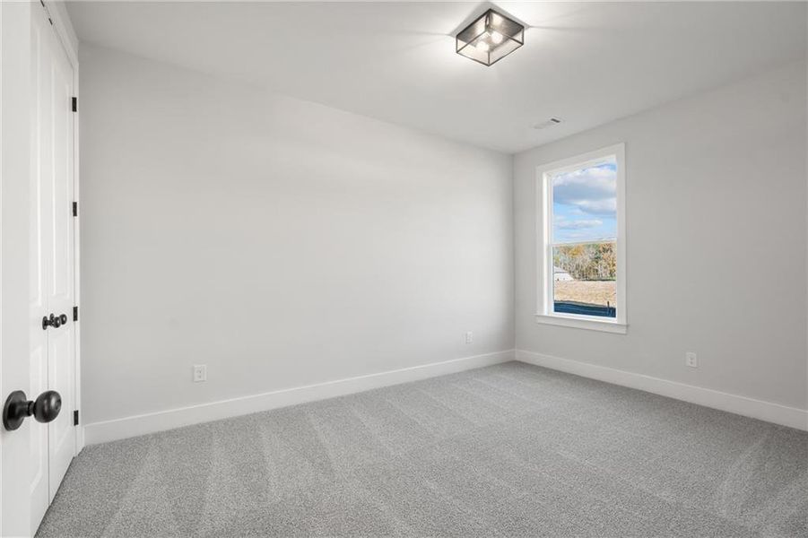 Spacious, unfurnished interior of a new home in Yellowstone Farms, Cumming (Image 37).
