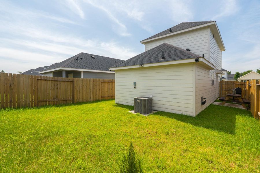 Large backyard ideal for entertaining, pets, or play Large backyard ideal for entertaining, pets, or play