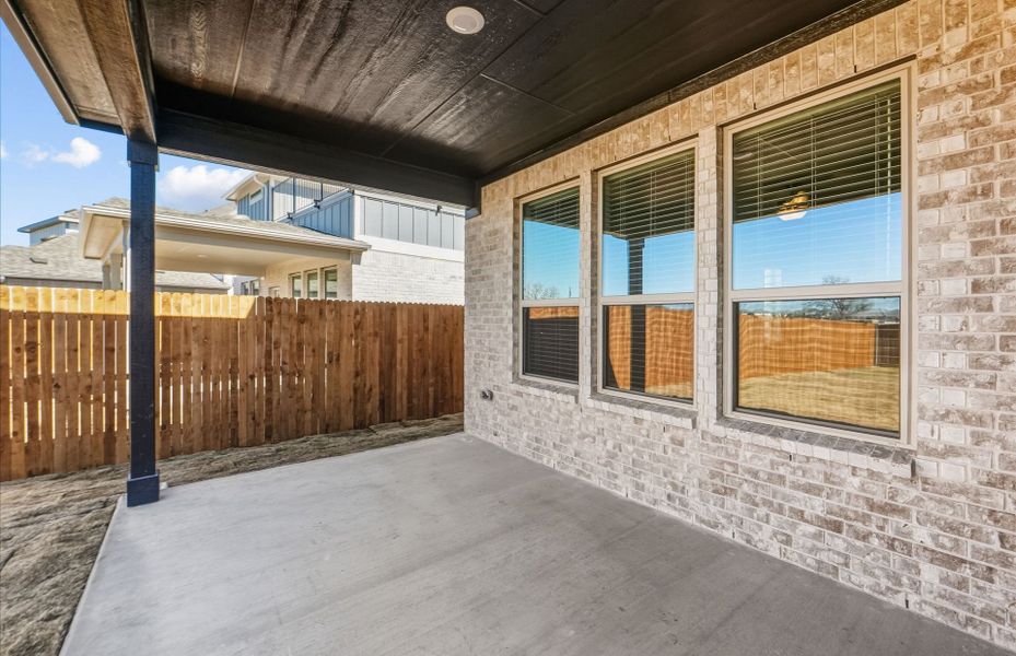 Exterior details and patio area of a home in Santa Rita Ranch, Liberty Hill (Image 24).
