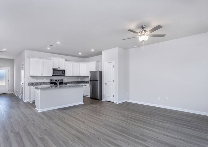 The kitchen overlooks the living area