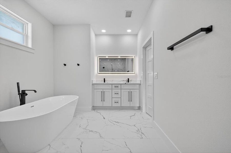 Furnished interior view inside a new home in , Tampa (Image 12).