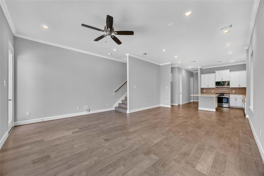 Durable and Stylish Flooring – Hardwood floors throughout the main living areas add warmth and sophistication to the home’s design.