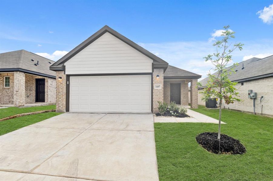 Front exterior of a new home in Christian Meadows, Ennis, TX, highlighting curb appeal (Image 1). Front exterior of a new home in Christian Meadows, Ennis, TX, highlighting curb appeal (Image 1).