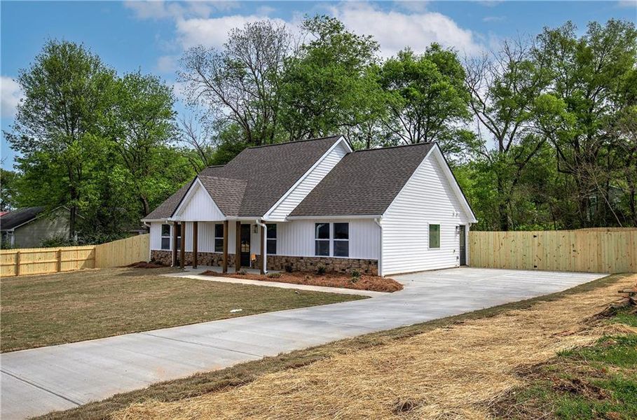 Front exterior of a new home in , Rockmart, GA, highlighting curb appeal (Image 25). Front exterior of a new home in , Rockmart, GA, highlighting curb appeal (Image 25).