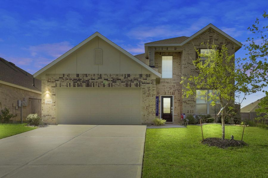 Front exterior of a new home in , Conroe, TX, highlighting curb appeal (Image 18).